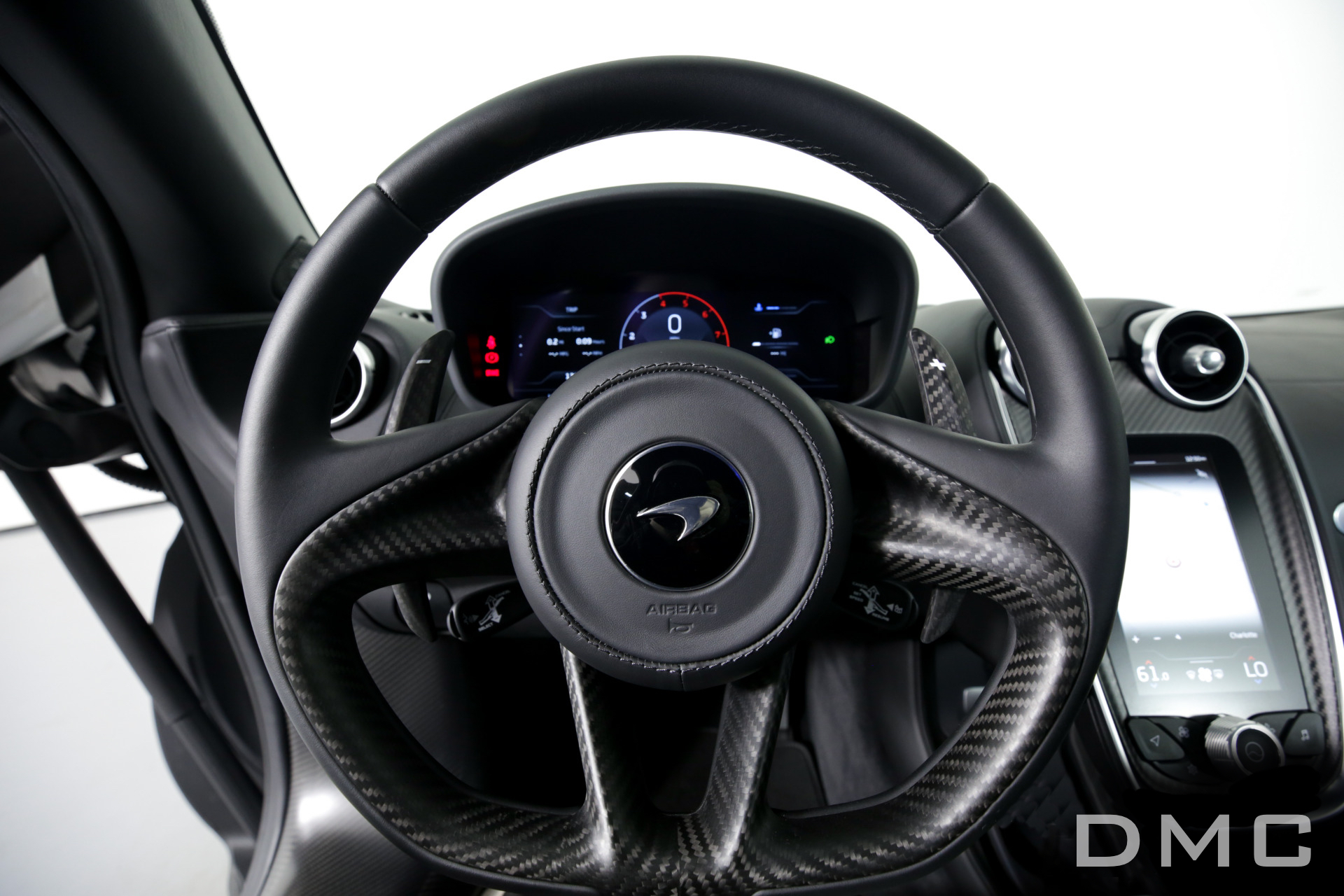 McLaren GT Forged Carbon Fiber Interior Kit: Steering Wheel, Center Console  Cover, Media Frame, Inner Door Trims, Pilot Dashboard - DMC