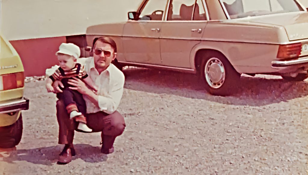 Heinrich Schoener with his son Gregor Hans Schoener in 1977 in Germany, admiring cars