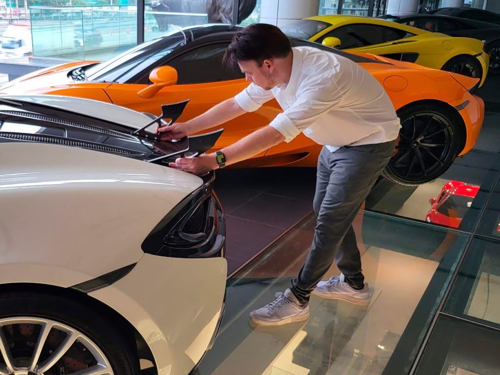 DMC's CEO learned about cars from his father, an automotive life of passion