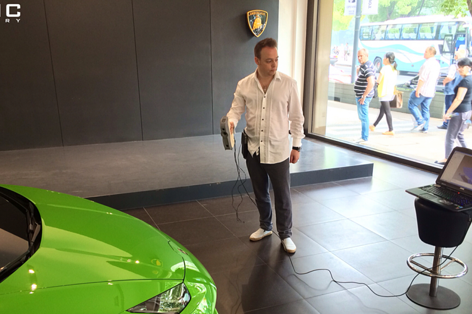 German Engineer performing 3D Scan of a Lamborghini Huracan Super Car